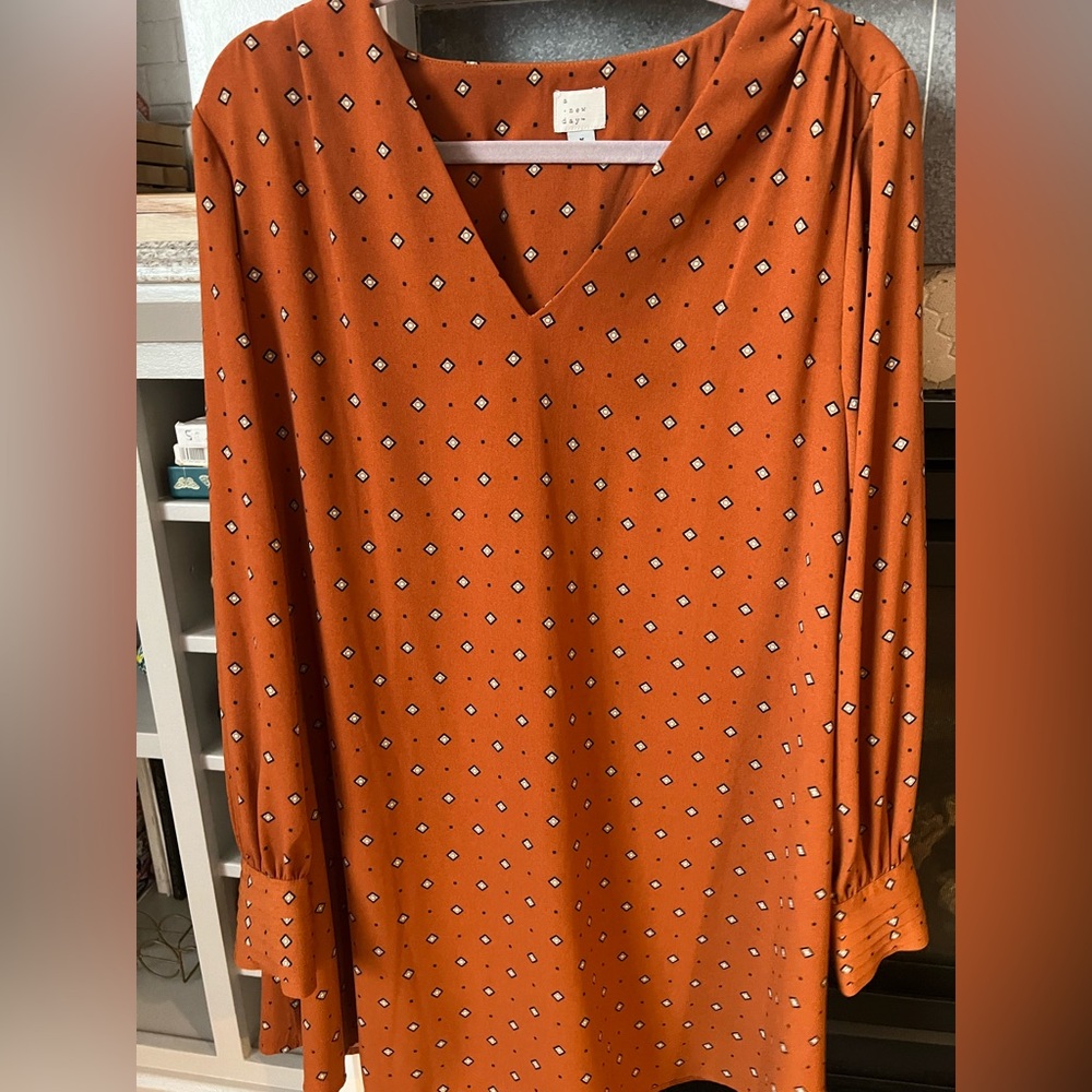 Orange V-Neck Dress with Diamond Pattern